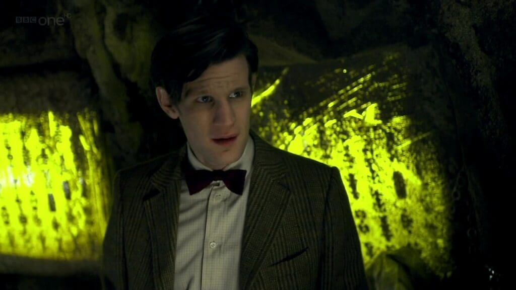 The Eleventh Doctor, looking sad