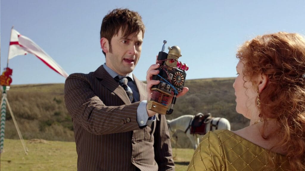 The Tenth Doctor, holding up his machine that goes ding to Queen Elisabeth I