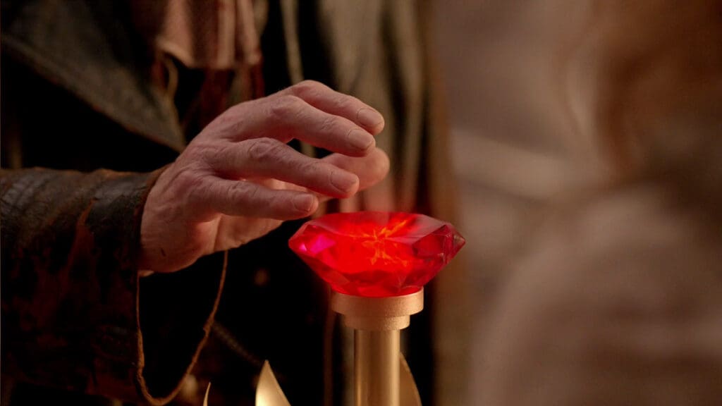 The War Doctor's hand hovers over the Big Red Button of The Moment