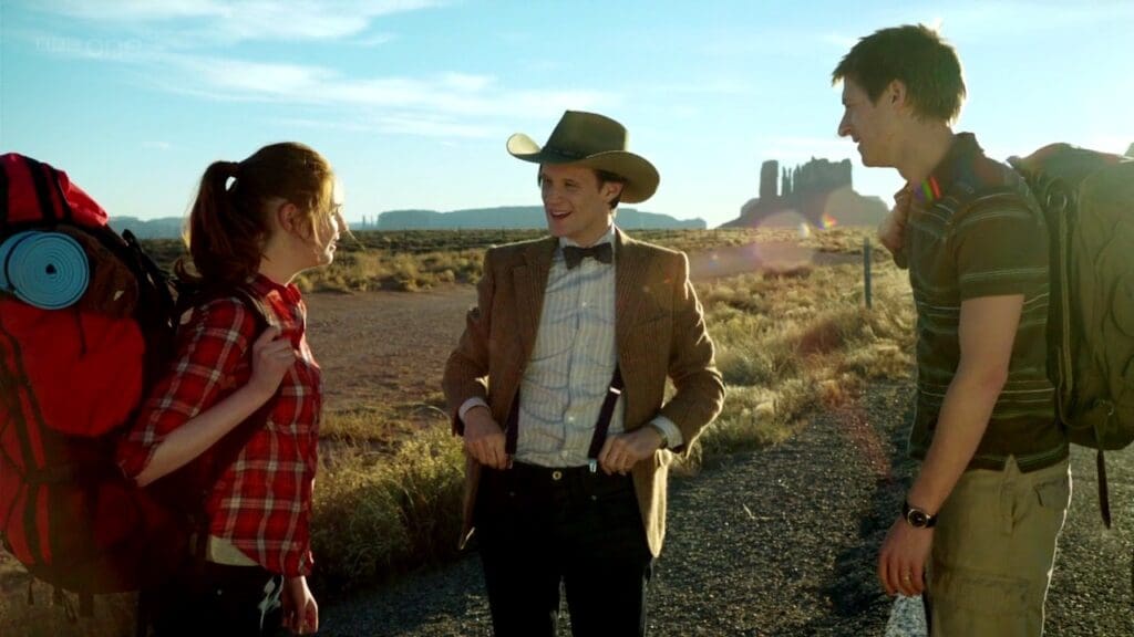 Amy, the Doctor, and Rory, in America. The Doctor is wearing a Stetson.