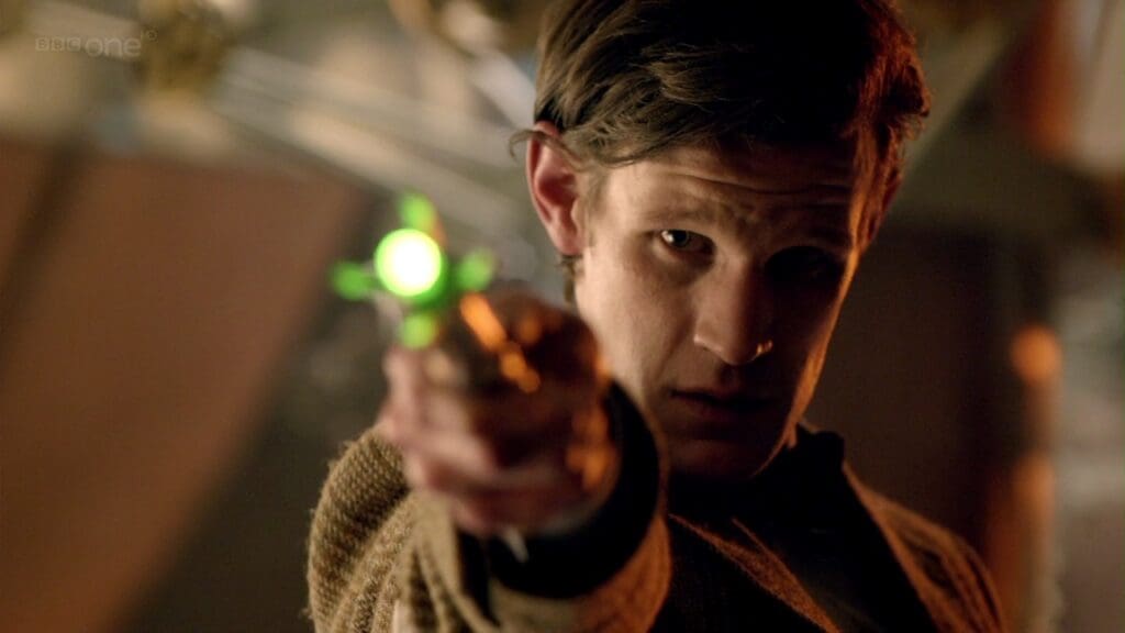 The Doctor using the Sonic on Amy