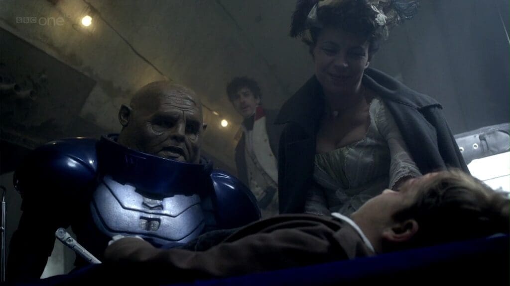 Strax the nurse, attending to a patient