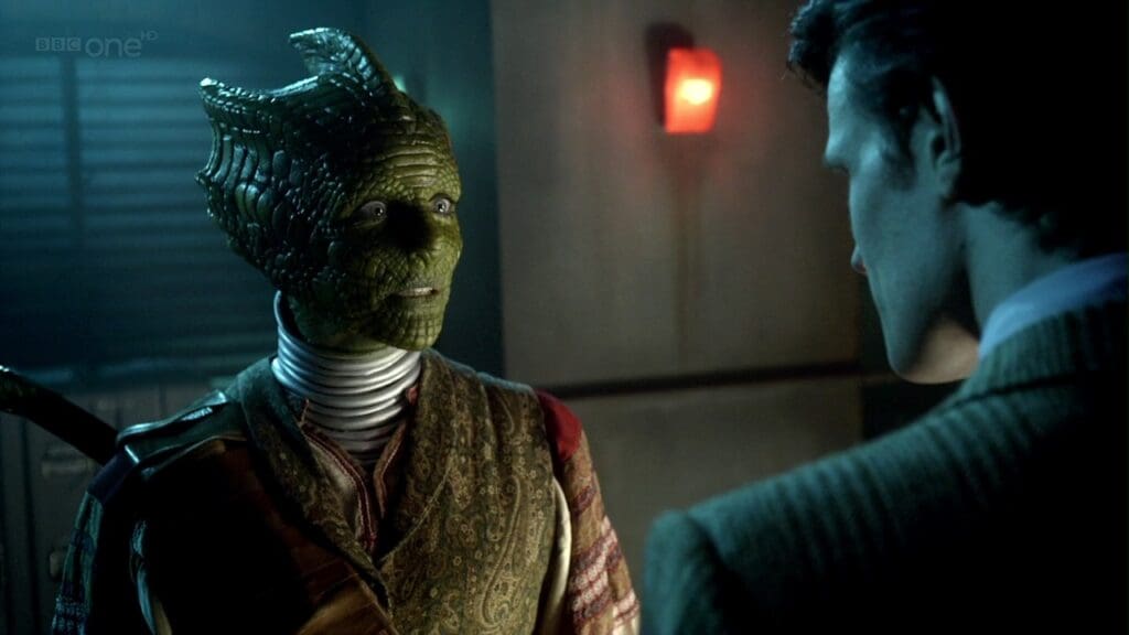 Vastra talking to the Doctor