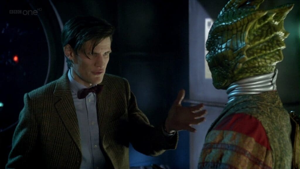 The Doctor talking to Vastra
