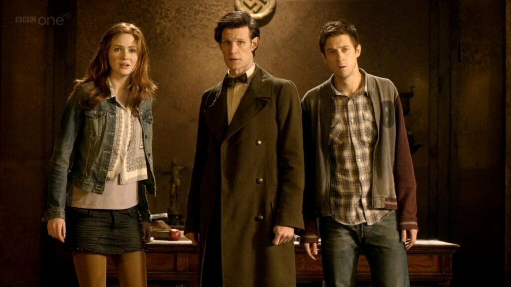 Amy, The Doctor, and Rory, looking stunned