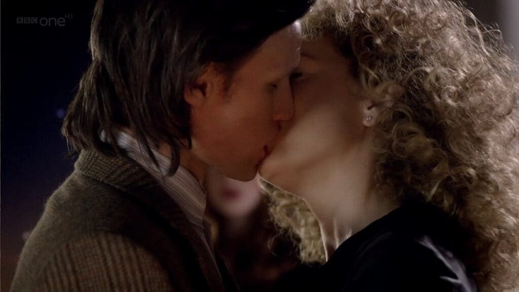 The Doctor and River, kissing during their wedding